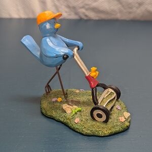 Russ tweet along with me blue bird figure mowing lawn